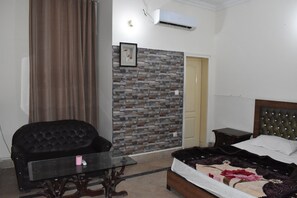 Double Room | Living area | LED TV - Bright Hotel (Lahore)