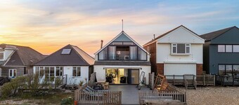 Exclusive Beachfront Home with Panoramic Views & Family Fun.