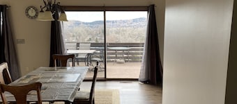 3,900 sq ft house with a big deck and a great view of the hills and canyon lake