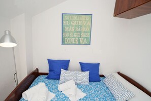 2 slaapkamers, een strijkplank/strijkijzer, beddengoed