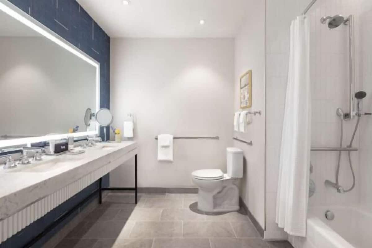 Bathroom | Designer toiletries, hair dryer, towels