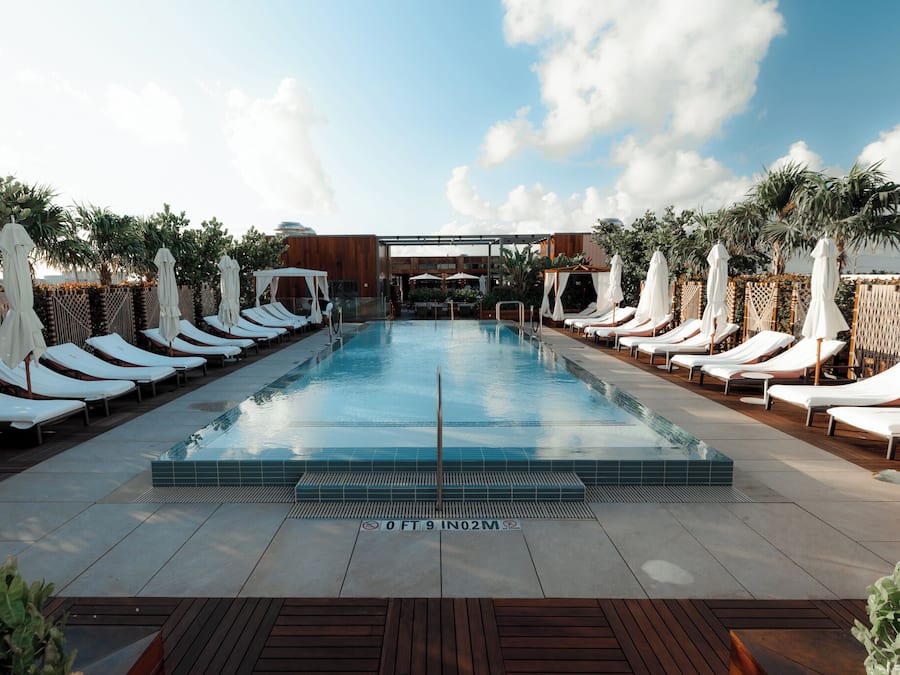 Outdoor pool, pool umbrellas, pool loungers