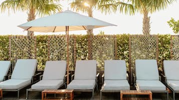 Outdoor pool, pool umbrellas, pool loungers