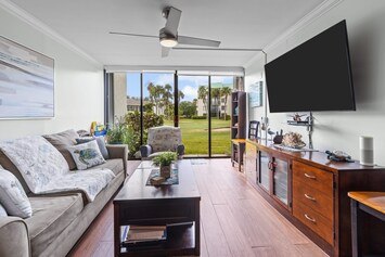 Livingroomarea with queen pullout sleeping sofa .
