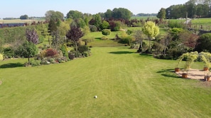 Enjoy a serene round of golf amidst lush green fairways and scenic surroundings.