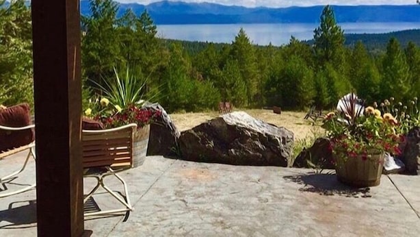A covered outdoor area with a view of a lake and mountains. - 7 Bedroom 9 Bed 5 Star 20 Acre Estate 7 Bathrooms, Remarkable Lake Views,Privacy (Somers)