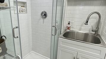 Shower, eco-friendly toiletries, hair dryer, towels