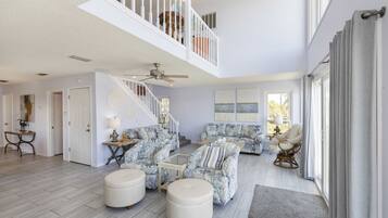Smart TV, fireplace, books, offices