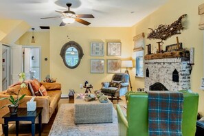 Smart TV, fireplace, books, stereo