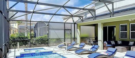 Outdoor pool, a heated pool, pool loungers