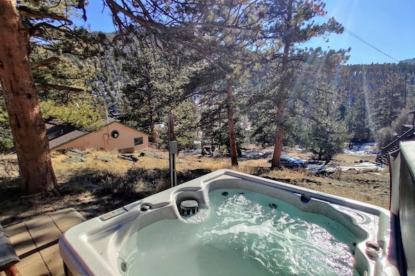 Hot tub just a short walk from cabin (shared in high season, private in winter)