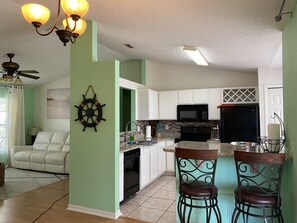 Coffee/tea maker, fridge, microwave, oven