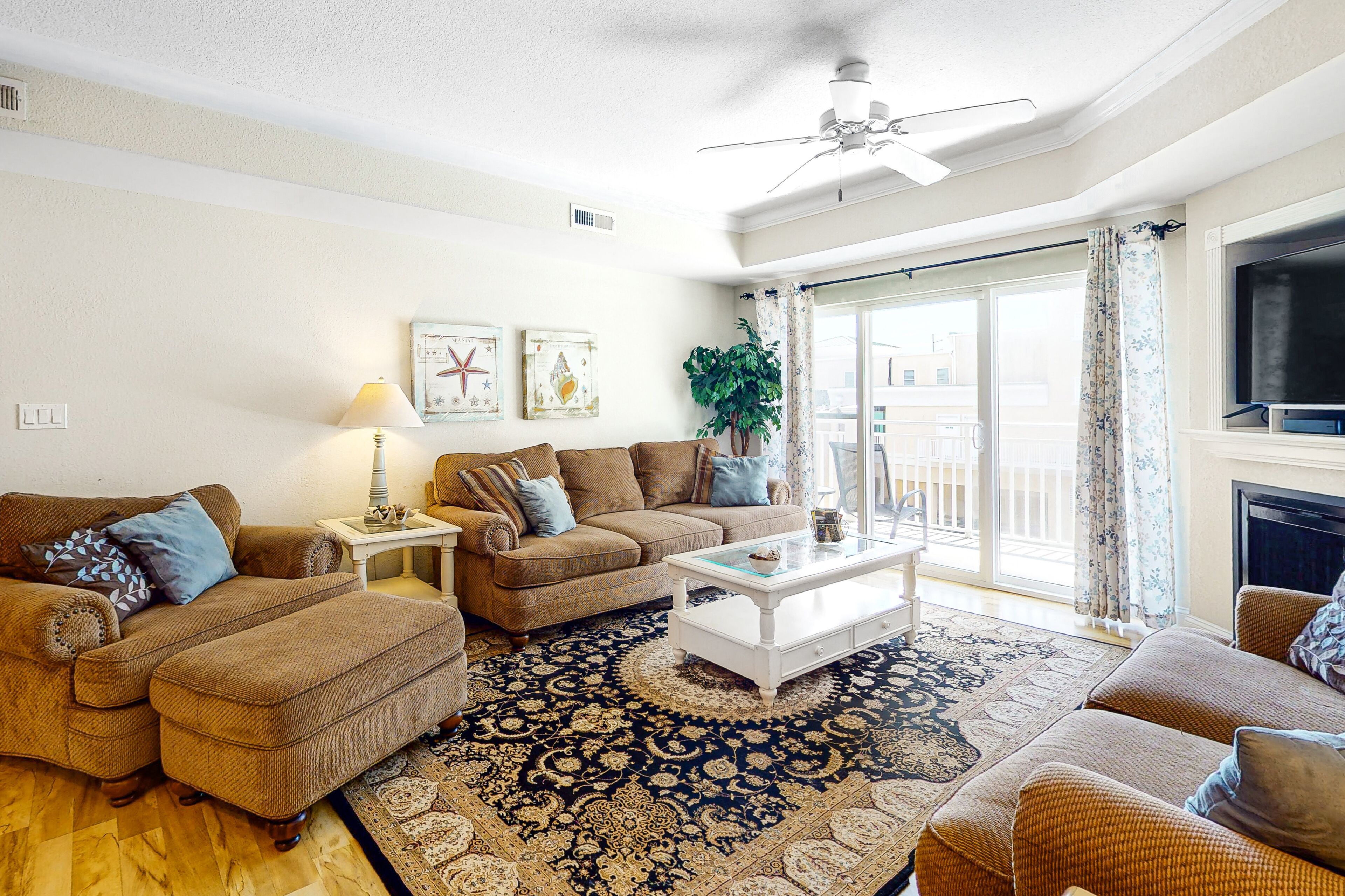 Waterfront condo near golf with rooftop pool, balcony, central AC, & W/D