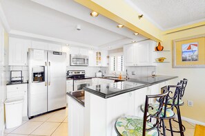 Fridge, microwave, oven, stovetop - Oceanfront Golden Surf Condo with ocean view, AC & W/D - the beach awaits (Ocean City)