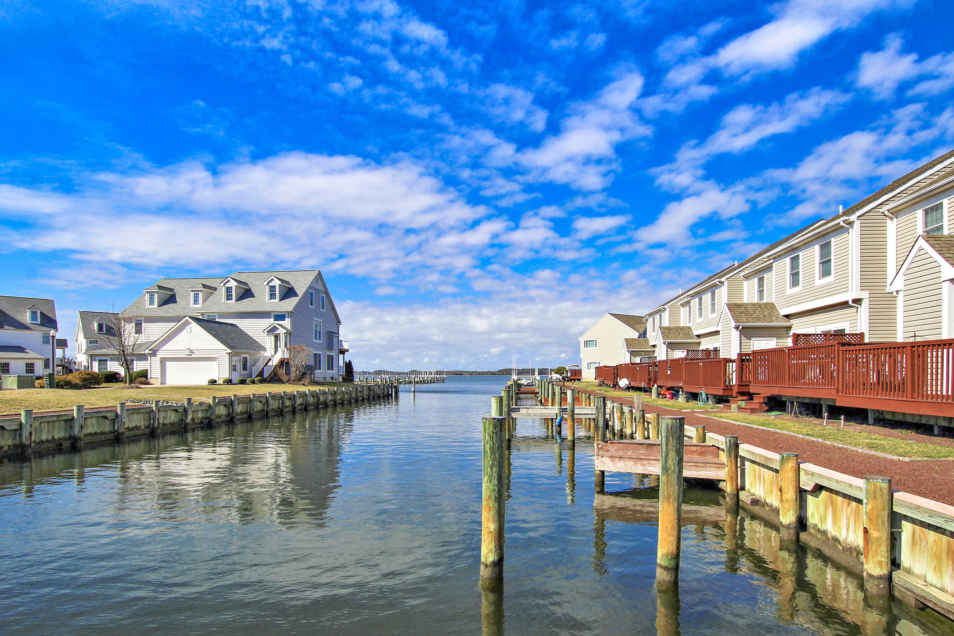 Immaculate townhouse right on the water with amazing views & deck - golf nearby