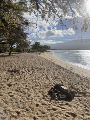 On the beach, sun loungers, beach towels