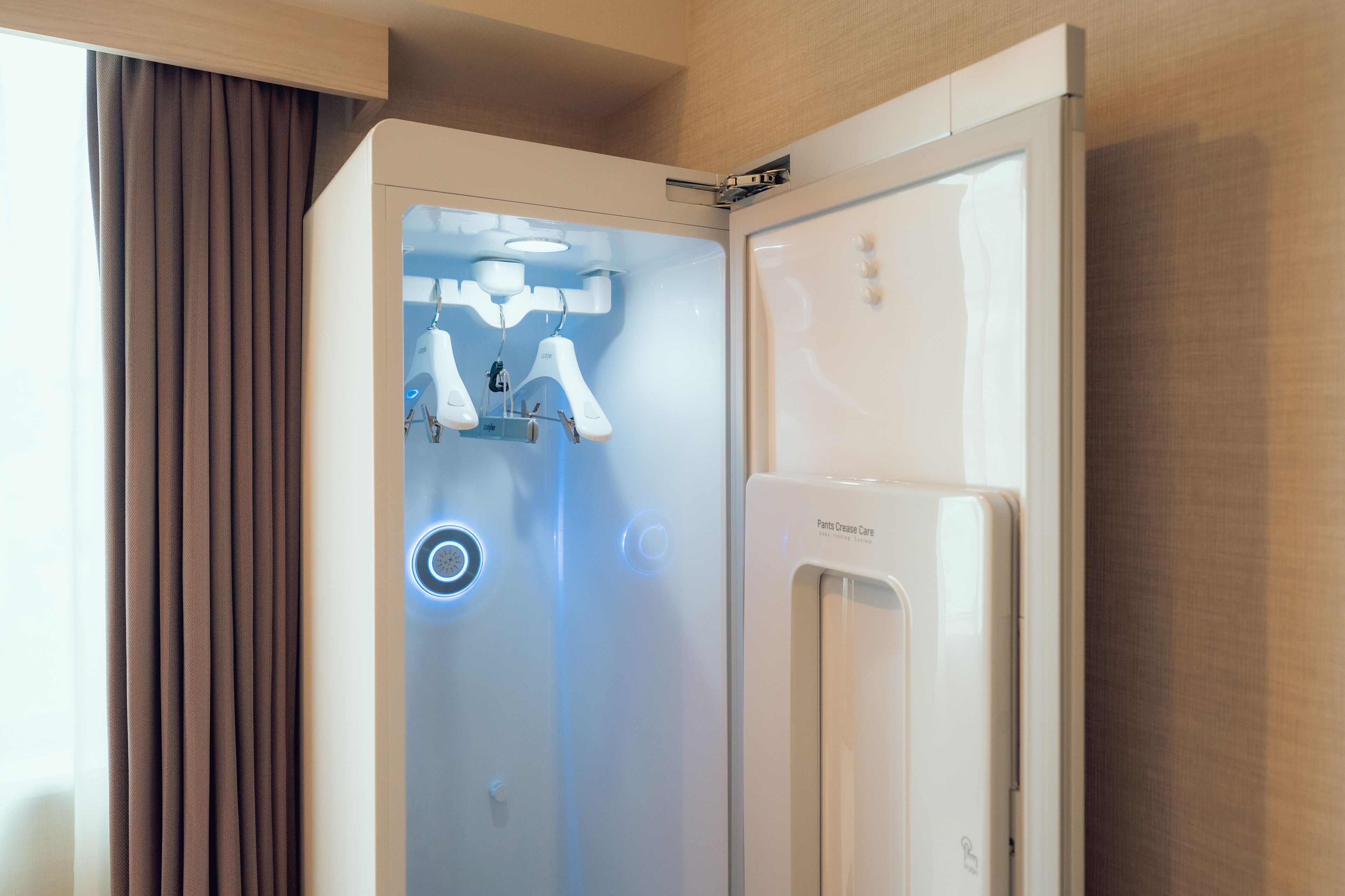 A modern bathroom with a shower, a toilet, and a vanity.