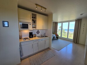 Fridge, microwave, dishwasher, coffee/tea maker