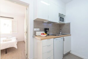 Fridge, microwave, coffee/tea maker, electric kettle