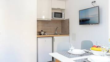 Fridge, microwave, coffee/tea maker, electric kettle