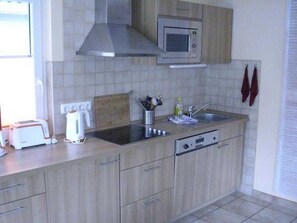 Fridge, microwave, dishwasher, coffee/tea maker