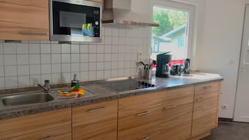 Fridge, microwave, dishwasher, coffee/tea maker