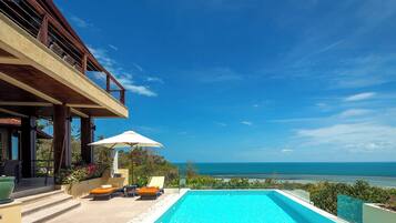 Outdoor pool, pool umbrellas, sun loungers