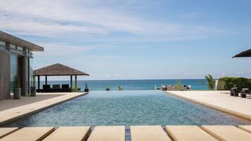 Relax by the ocean with a serene infinity pool and stunning views.
