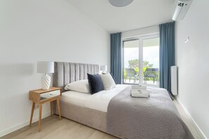 Deluxe-Apartment | Bügeleisen/Bügelbrett, Bettwäsche