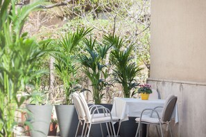 Apartamento conforto | Terraço/pátio