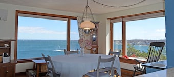 The View: A classic New England cottage with panoramic ocean views.