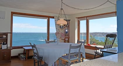 The View: A classic New England cottage with panoramic ocean views.