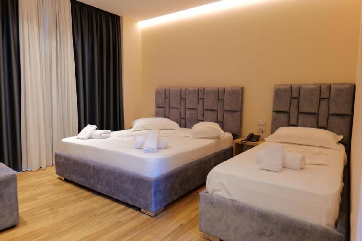 Habitación triple Deluxe, vista al mar, planta baja | Wifi gratis 
