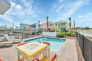 Sun-soaked Elegance: Bask in the glory of our outdoor swimming pool, where every moment is a picture-perfect escape, complemented by cozy lounge chairs for your utmost comfort.