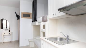 Shower, hair dryer, towels, toilet paper