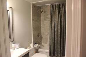 Hair dryer, towels, soap, shampoo