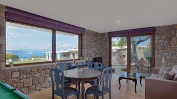 Superior Villa, Multiple Bedrooms, Private Pool, Sea View | Living area | Smart TV, fireplace, Netflix, ping pong