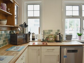 Dishwasher, high chair, cookware/dishes/utensils