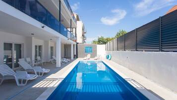 Room, 1 Bedroom, Balcony, Garden View | Pool | Outdoor pool