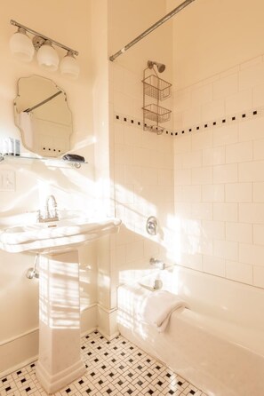 Bathtub, hair dryer, towels