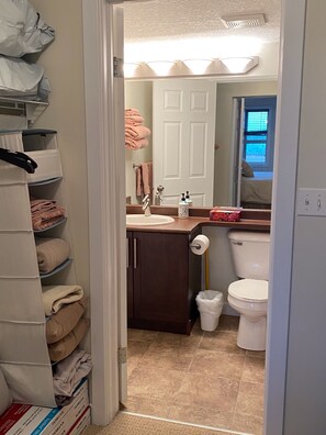 Combined shower/bathtub, hair dryer, towels, soap