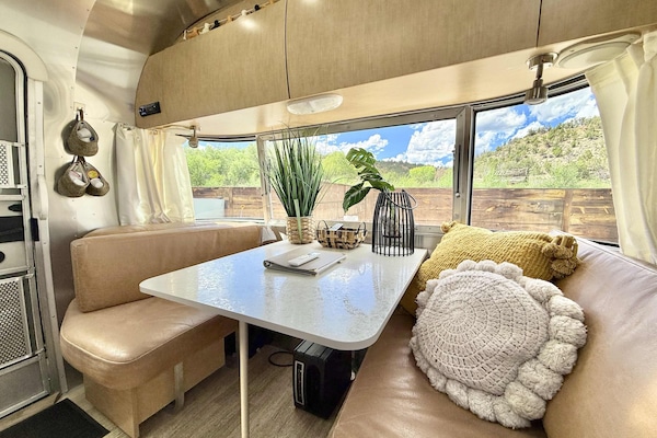 Dinner with a view! The dining table converts to another bed.