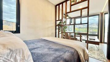 1 dormitorio, tabla de planchar con plancha, wifi y ropa de cama