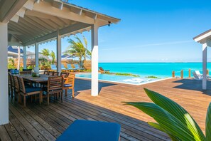 Outdoor dining - The Sandbar Luxury Oceanfront Home, 5 Bedroom 5 Bath, Infinity Pool/Hot Tub (Exuma)