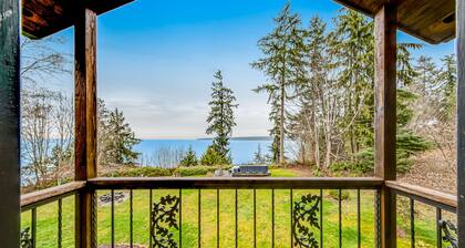 Idyllic woodsy retreat with firepit, two kitchens, Port Susan views & woodstoves