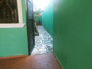 Exterior detail - Guest house, annex to the main house, back on terrace or patio (Santo Domingo este)