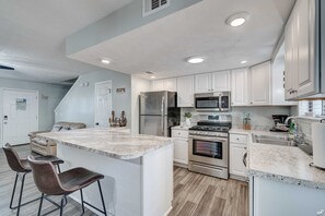 Ice maker, dining tables, kitchen islands