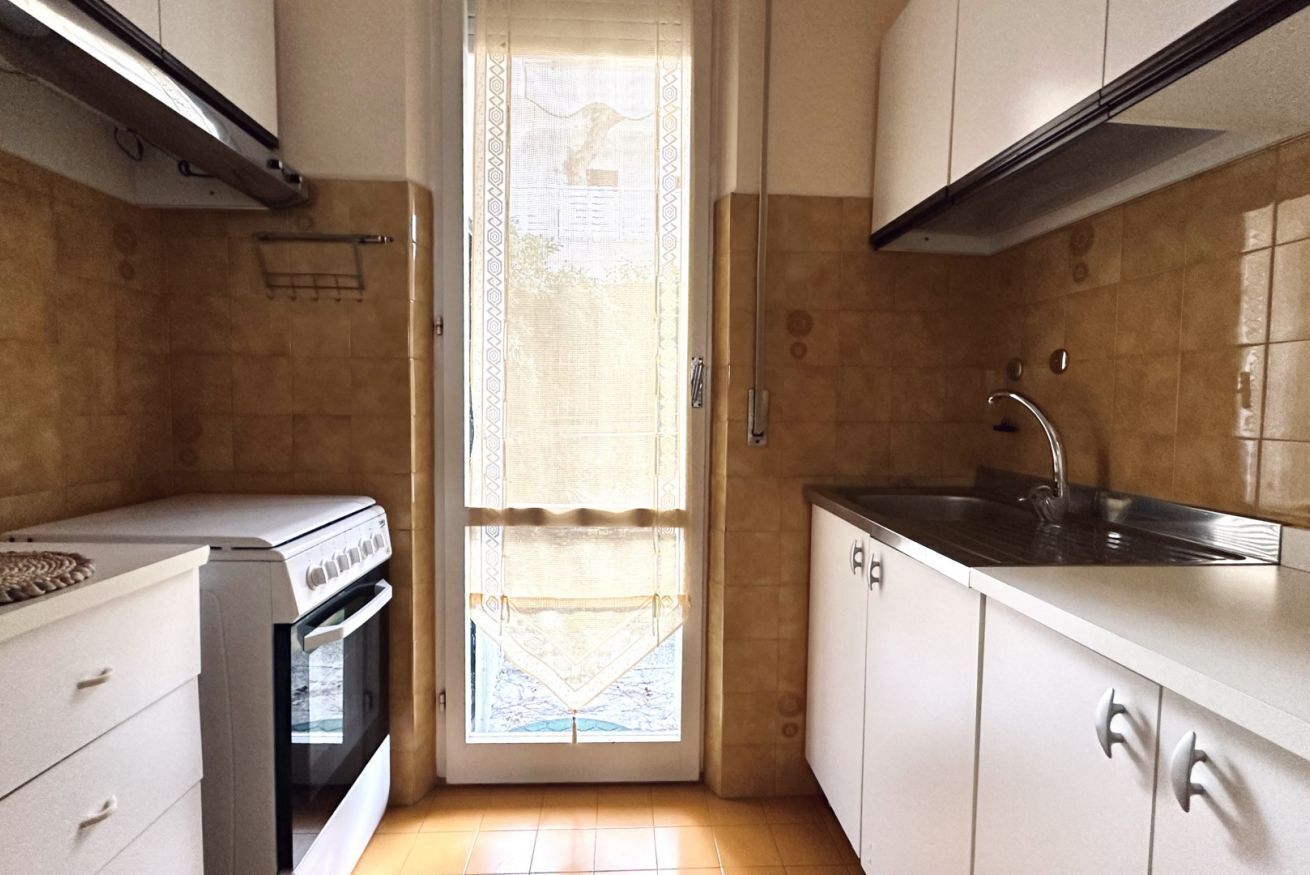 Fridge, oven, dining tables