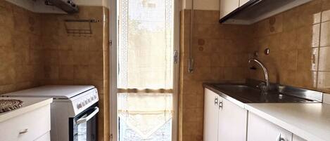 Fridge, oven, dining tables