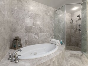 Shower, jetted bath, towels